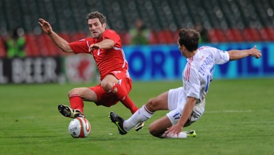 09.09.09 -  Wales v Russia - World Cup 2010 Qualifier Group Four - Sam Ricketts of Wales and Konstantin Zyryanov of Russia compete. 