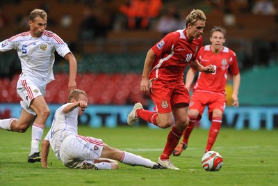 09.09.09 - Wales v Russia - World Cup 2010 Qualifier Group Four - David Edwards of Wales is challenged by Alexander Anyukov of Russia. 