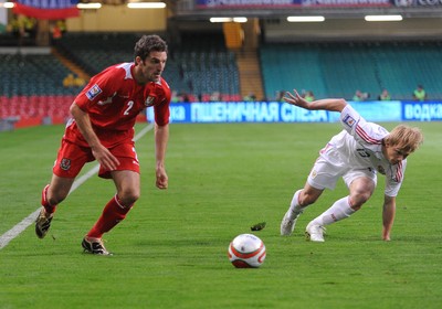 09.09.09 - World Cup Qualifying Group 4 Wales v Russia Wales' Sam Ricketts  gets past Russia's Renat Yanbaev  