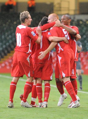 09.09.09 - World Cup Qualifying Group 4 Wales v Russia Wales' James Collins  (2nd R) is congratulated after scoring goal 
