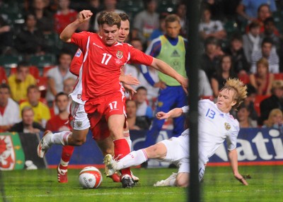 09.09.09 - World Cup Qualifying Group 4 Wales v Russia Wales' Sam Vokes is tackled by Russia's Renat Yanbaev  