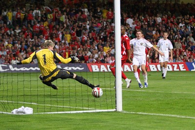 09.09.09 Wales v Russia... Russia's Igor Semshov scoring goal past Wales' keeper Wayne Hennessey . 