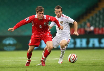 09.09.09 Wales v Russia... Wales' Aaron Ramsey holding of the challenge of Russia's Alexander Kerzhakov. 