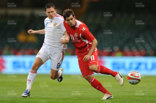 09.09.09 -  Wales v Russia - World Cup 2010 Qualifier Group Four - Joe Ledley of Wales is challenged by Igor Semshov of Russia. 