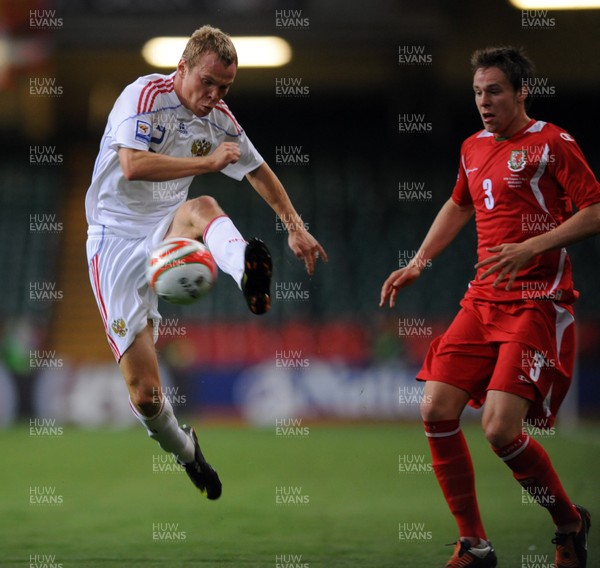 09.09.09 -  Wales v Russia - World Cup 2010 Qualifier Group Four - Alexander Anyukov of Russia gets past Chris Gunter of Wales. 