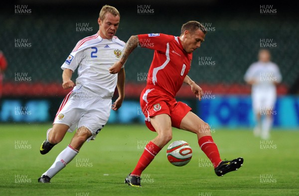 09.09.09 -  Wales v Russia - World Cup 2010 Qualifier Group Four - Craig Bellamy of Wales is challenged by Alexander Anyukov of Russia. 