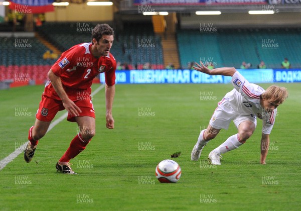 09.09.09 - World Cup Qualifying Group 4 Wales v Russia Wales' Sam Ricketts  gets past Russia's Renat Yanbaev  