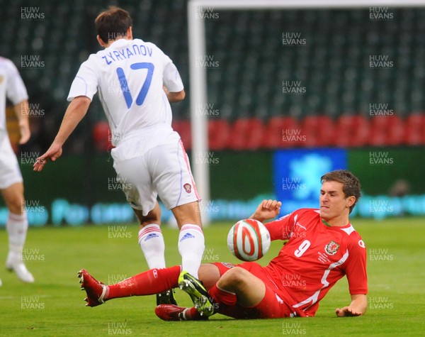 09.09.09 - World Cup Qualifying Group 4 Wales v Russia Wales' Aaron Ramsey  wins the ball from Russia's Konstantin Zyryanov  