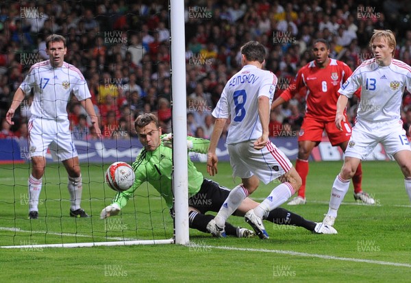 09.09.09 - World Cup Qualifying Group 4 Wales v Russia Russia's keeper Igor Akinfeev fails to keep a shot from Wales' James Collins  out of his net 