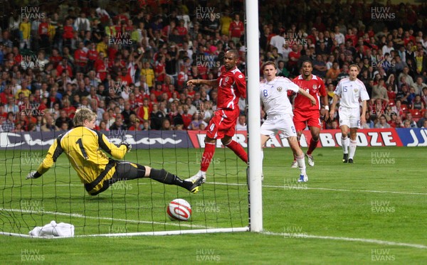 09.09.09 Wales v Russia... Russia's Igor Semshov scoring goal past Wales' keeper Wayne Hennessey . 