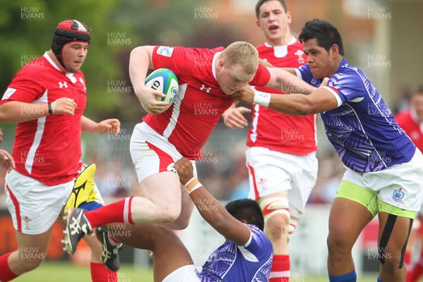 050613 Wales U20 v Samoa U20 IRB Junior World ChampionshipWales Ethan Lewis drives through the Samoan defence