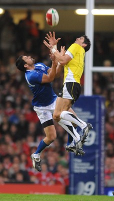 13.11.09 - Wales v Samoa - Invesco Perpetual Series 2009 - Wales' James Hook competes for high ball with Samoa's Gavin Williams. 