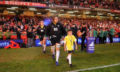 13.11.09 - Wales v Samoa - Invesco Perpetual Series 2009 - Wales' Ryan Jones leads out his team with mascot Henry Walters. 