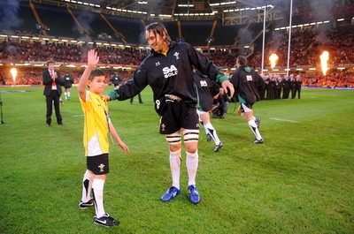 13.11.09 - Wales v Samoa - Invesco Perpetual Series 2009 - Wales' Ryan Jones leads out his team with mascot Henry Walters. 
