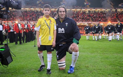 13.11.09 - Wales v Samoa - Invesco Perpetual Series 2009 - Wales' Ryan Jones leads out his team with mascot Henry Walters. 