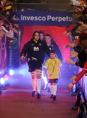 13.11.09 - Wales v Samoa - Invesco Perpetual Series 2009 - Wales' Ryan Jones leads out his team with mascot Henry Walters. 