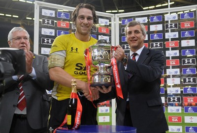 13.11.09 - Wales v Samoa - Invesco Perpetual Series 2009 - Wales' Ryan Jones receives the winners trophy from Rick White of Inveco Perpetual. 