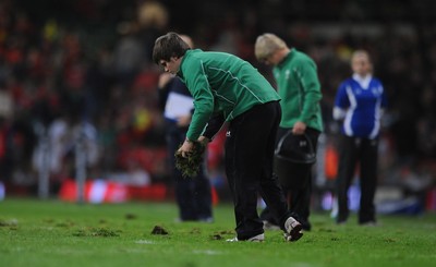 13.11.09 - Wales v Samoa - Invesco Perpetual Series 2009 - Millennium Stadium pitch staff remove lumps of grass at half time. 