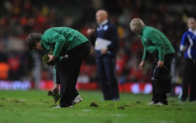 13.11.09 - Wales v Samoa - Invesco Perpetual Series 2009 - Millennium Stadium pitch staff remove lumps of grass at half time. 