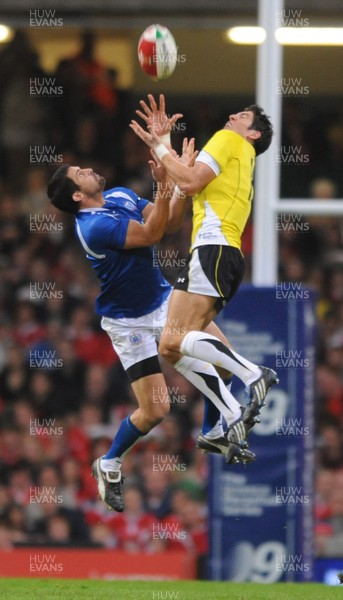 13.11.09 - Wales v Samoa - Invesco Perpetual Series 2009 - Wales' James Hook competes for high ball with Samoa's Gavin Williams. 