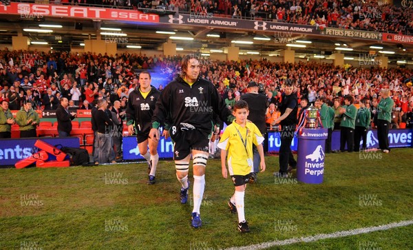 13.11.09 - Wales v Samoa - Invesco Perpetual Series 2009 - Wales' Ryan Jones leads out his team with mascot Henry Walters. 