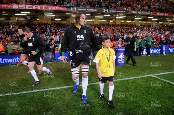 13.11.09 - Wales v Samoa - Invesco Perpetual Series 2009 - Wales' Ryan Jones leads out his team with mascot Henry Walters. 