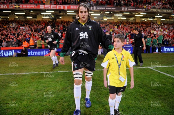 13.11.09 - Wales v Samoa - Invesco Perpetual Series 2009 - Wales' Ryan Jones leads out his team with mascot Henry Walters. 