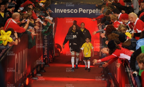 13.11.09 - Wales v Samoa - Invesco Perpetual Series 2009 - Wales' Ryan Jones leads out his team with mascot Henry Walters. 