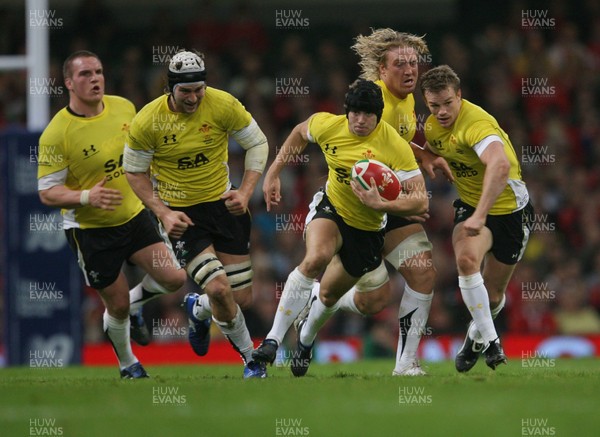 13.11.09 Wales v Samoa... Wales' Leigh Halfpenny breaks through. 