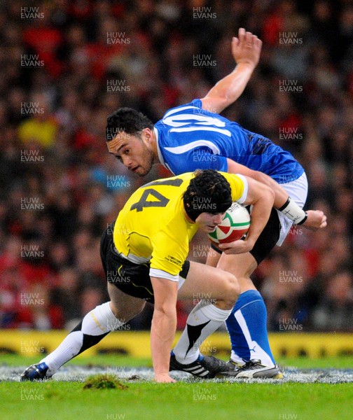 13.11.09 - Invesco Perpetual International Rugby, Wales v Samoa Wales' Leigh Halfpenny tries to get past Samoa's Fa'atonu Fili 