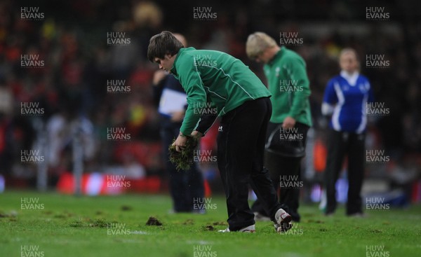 13.11.09 - Wales v Samoa - Invesco Perpetual Series 2009 - Millennium Stadium pitch staff remove lumps of grass at half time. 