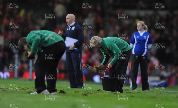 13.11.09 - Wales v Samoa - Invesco Perpetual Series 2009 - Millennium Stadium pitch staff remove lumps of grass at half time. 