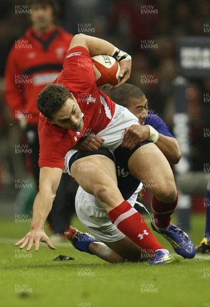 161112 - Wales v Samoa, Dove Men Series 2012 - Wales' George North is tackled by Samoa's Paul Perez  