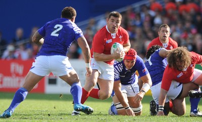 18.09.11 - Wales v Samoa - Rugby World Cup 2011 - Huw Bennett of Wales takes on Mahonri Schwalger of Samoa. 
