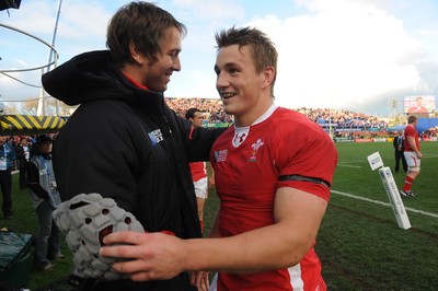 18.09.11 - Wales v Samoa - Rugby World Cup 2011 - Jonathan Davies of Wales is congratulated by Ryan Jones at the end of the game. 