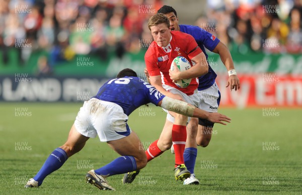 18.09.11 - Wales v Samoa - Rugby World Cup 2011 - Rhys Priestland of Wales takes on Paul Williams of Samoa. 