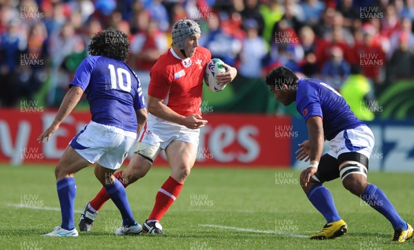 18.09.11 - Wales v Samoa - Rugby World Cup 2011 - Jonathan Davies of Wales takes on Ofisa Treviranus of Samoa. 