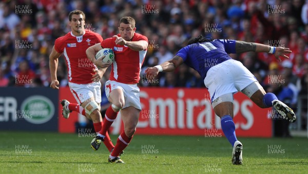 18.09.11 - Wales v Samoa - Rugby World Cup 2011 - Shane Williams of Wales takes on Anitelea Tuilagi of Samoa. 