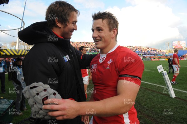 18.09.11 - Wales v Samoa - Rugby World Cup 2011 - Jonathan Davies of Wales is congratulated by Ryan Jones at the end of the game. 