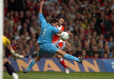28.03.07 - Wales v San Marino - UEFA Euro 2008 Qualifying Group D - Wales' Ryan Giggs tries to shoot past Matteo Andreini 