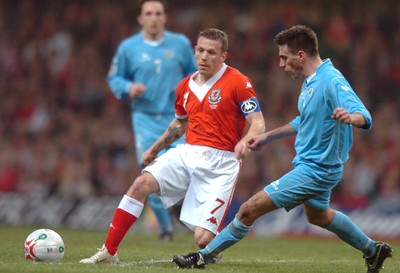 28.03.07 - Wales v San Marino - UEFA Euro 2008 Qualifying Group D - Wales' Craig Bellamy puts the ball past Matteo Andreini 