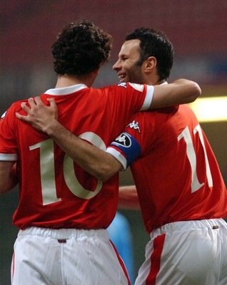 28.03.07 - Euro 2008 Qualifier Wales v San Marino Wales' Captain Ryan Giggs (r) celebrates scoring an early goal with Simon Davies 