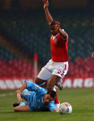 28.03.07 - Euro 2008 Qualifier Wales v San Marino Wales' Jermaine Easter is tackled by Matteo Andreini 