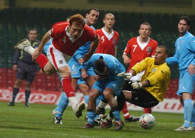 28.03.07 - Euro 2008 Qualifier Wales v San Marino Wales' James Collins tries to beat 'keeper Aldo Simoncini 