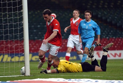 28.03.07 - Euro 2008 Qualifier Wales v San Marino Wales Jason Koumas strokes home his saved penalty to claim his sides third goal 