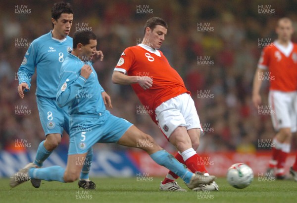 28.03.07 - Wales v San Marino - UEFA Euro 2008 Qualifying Group D - Wales' Jason Koumas is tackled by Riccardo Muccioli 