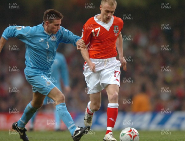 28.03.07 - Wales v San Marino - UEFA Euro 2008 Qualifying Group D - Wales' David Cotterill is tackled by Matteo Andreini 