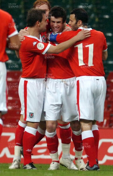28.03.07 - Euro 2008 Qualifier Wales v San Marino Wales' Gareth Bale (ctr) is congratulated after scoring his sides second goal 