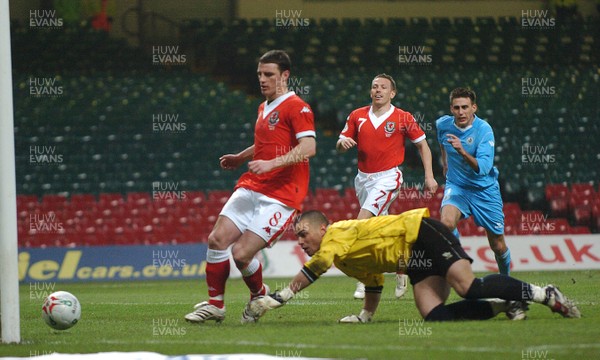 28.03.07 - Euro 2008 Qualifier Wales v San Marino Wales Jason Koumas strokes home his saved penalty to claim his sides third goal 