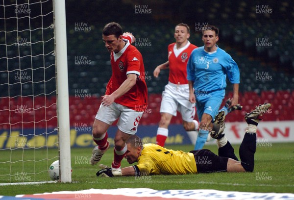 28.03.07 - Euro 2008 Qualifier Wales v San Marino Wales Jason Koumas strokes home his saved penalty to claim his sides third goal 
